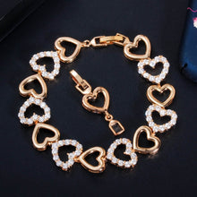 Load image into Gallery viewer, Hearts all Around Cubic Zirconia Gold or Silver Tone Bracelet