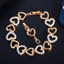 Load image into Gallery viewer, Hearts all Around Cubic Zirconia Gold or Silver Tone Bracelet
